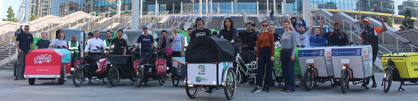 Image of a group of people standing with bikes