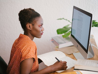 Woman at a computer working