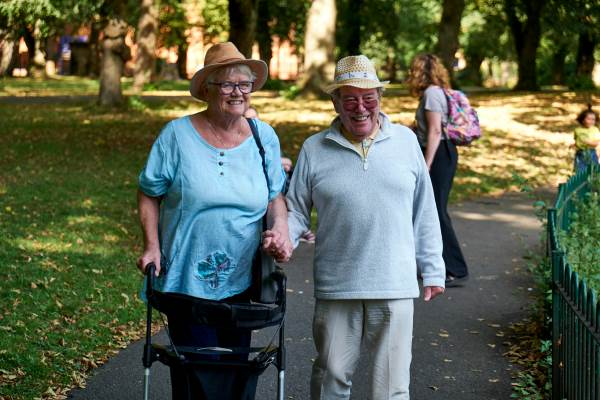 Older couple walking in brent park