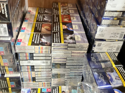Piles of seized illegal cigarette packets