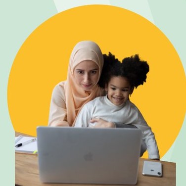 Mother and daughter looking at a laptop together