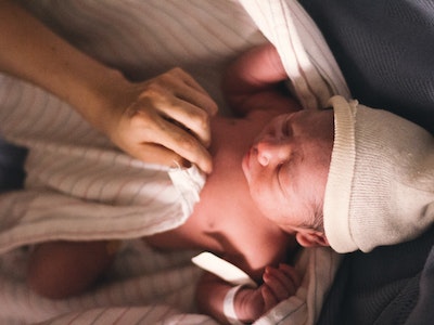 newborn baby wrapped in a blanket