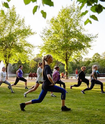 Group doing Yoga in the park